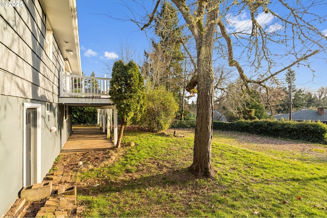 view of yard with a deck