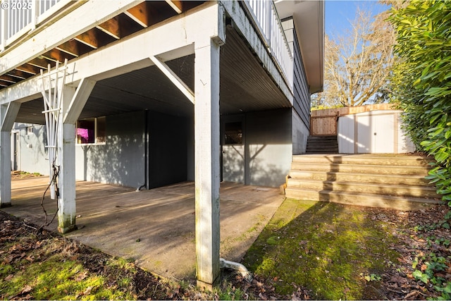 view of patio / terrace with a storage shed