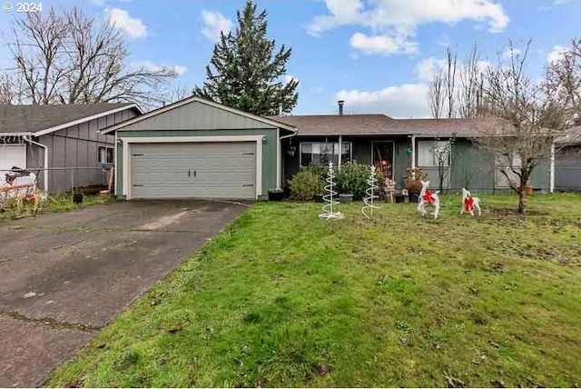 single story home with a garage and a front yard