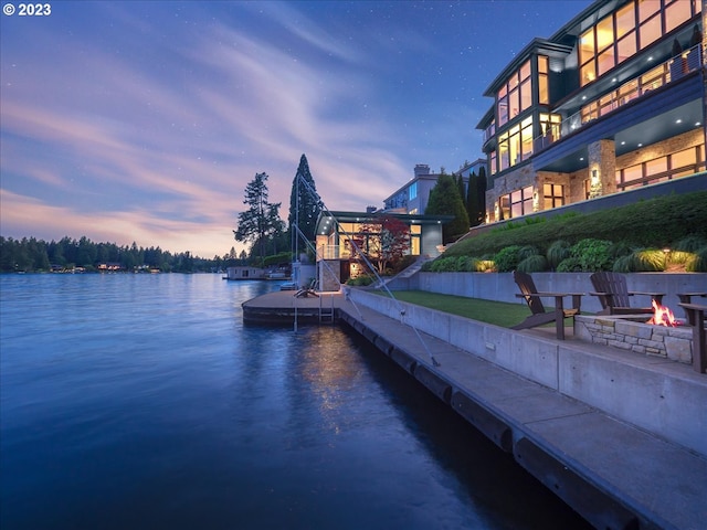 dock area with a water view