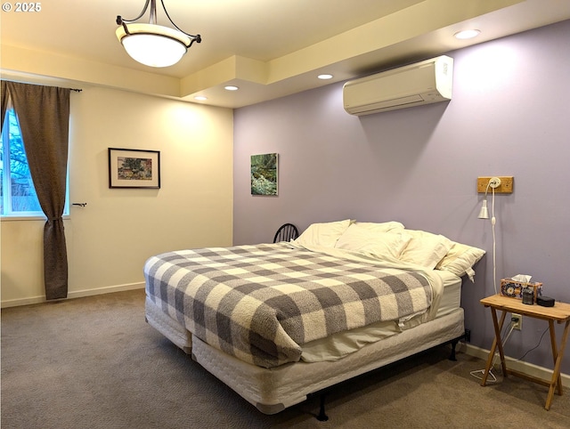 bedroom featuring carpet and an AC wall unit