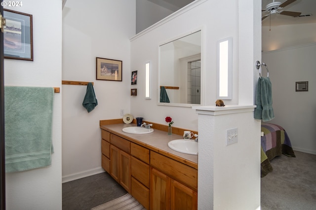 455 Chandler Dr, Roseburg, OR 97471 - bathroom with double vanity, a ceiling fan, ensuite bath, and baseboards