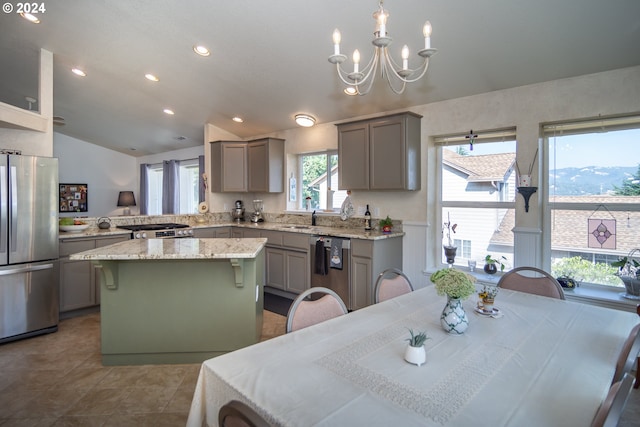 455 Chandler Dr, Roseburg, OR 97471 - kitchen featuring appliances with stainless steel finishes, gray cabinets, a kitchen island, recessed lighting, and a chandelier