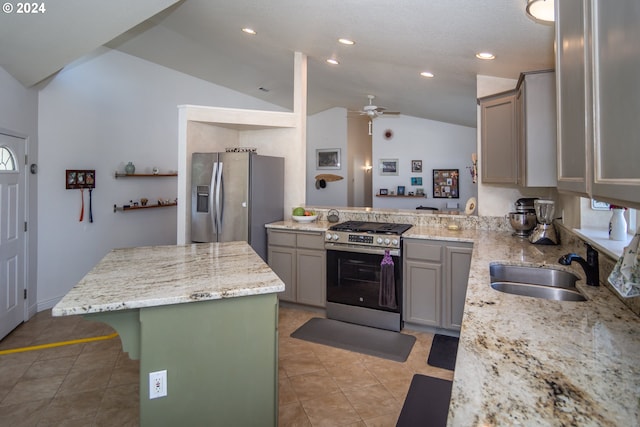 455 Chandler Dr, Roseburg, OR 97471 - kitchen featuring appliances with stainless steel finishes, lofted ceiling, light tile patterned floors, gray cabinetry, and ceiling fan