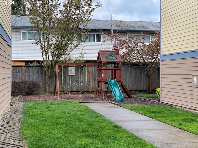 view of play area with a yard