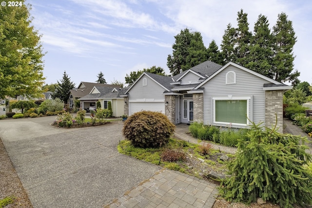 ranch-style home featuring a garage