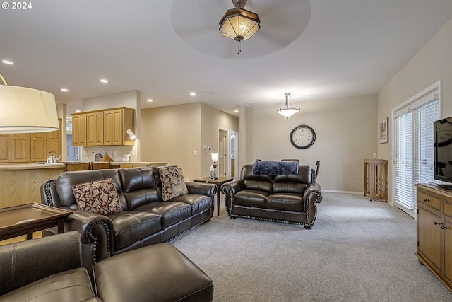 living room featuring light colored carpet