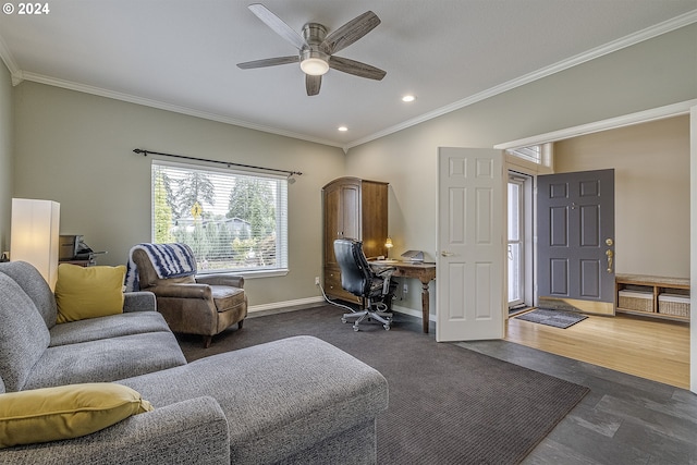 living room featuring ceiling fan, crown molding, and dark hardwood / wood-style flooring