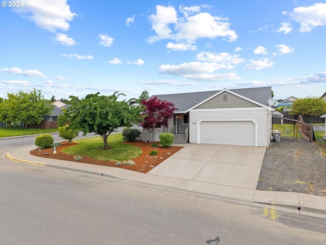 342 NW Denton Ave, Dallas, OR 97338 - view of front facade with an attached garage and driveway