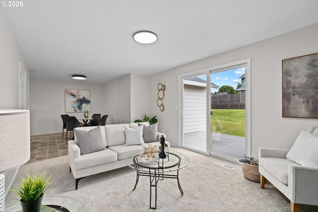 342 NW Denton Ave, Dallas, OR 97338 - carpeted living area with a textured ceiling
