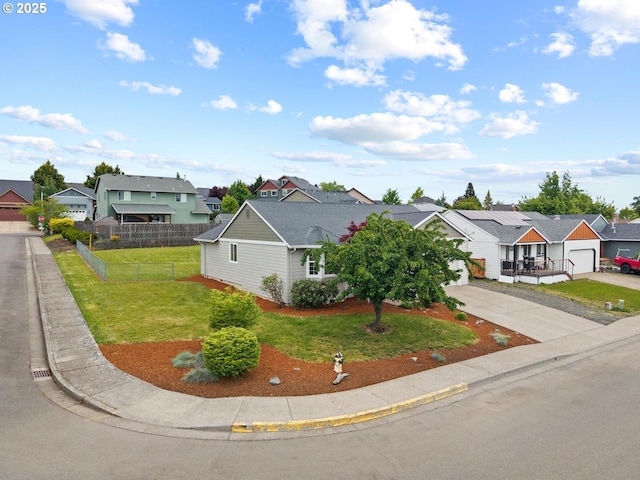 342 NW Denton Ave, Dallas, OR 97338 - view of front of home with a residential view, driveway, and a garage