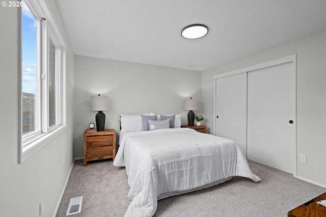 342 NW Denton Ave, Dallas, OR 97338 - carpeted bedroom featuring a closet and baseboards