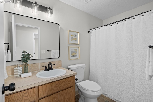 342 NW Denton Ave, Dallas, OR 97338 - bathroom featuring toilet, vanity, and a textured ceiling