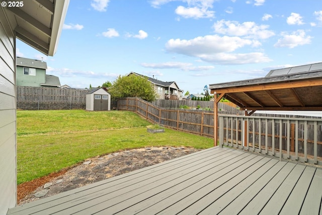 342 NW Denton Ave, Dallas, OR 97338 - wooden deck featuring a shed, an outdoor structure, and a residential view