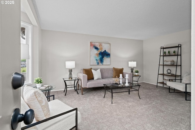 342 NW Denton Ave, Dallas, OR 97338 - carpeted living room featuring a textured ceiling and baseboards