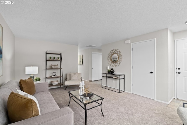 342 NW Denton Ave, Dallas, OR 97338 - living area featuring a textured ceiling, light colored carpet, and baseboards