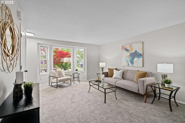 342 NW Denton Ave, Dallas, OR 97338 - carpeted living room featuring a textured ceiling and baseboards