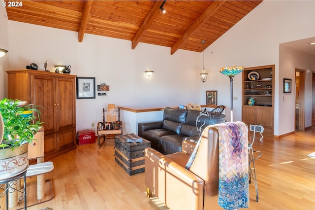 living room with light hardwood / wood-style flooring, wooden ceiling, and beamed ceiling