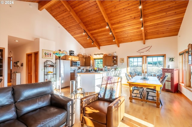 living room featuring wood ceiling, high vaulted ceiling, beamed ceiling, and light wood-type flooring