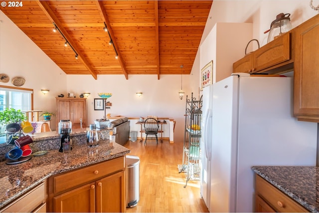 kitchen featuring wood ceiling, light hardwood / wood-style floors, white fridge, and dark stone countertops