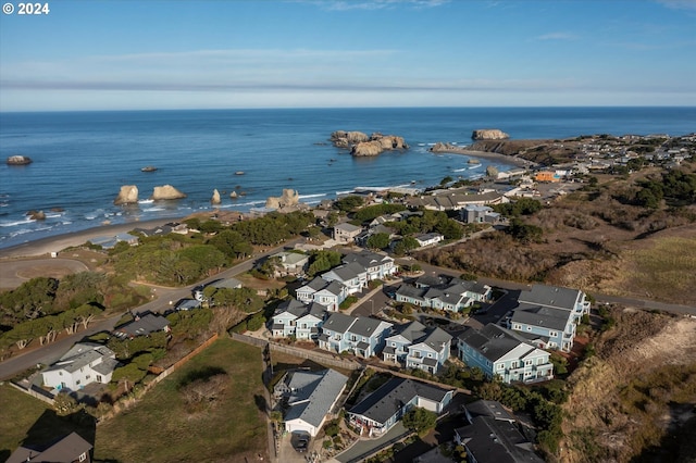 bird's eye view with a beach view and a water view