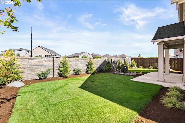 view of yard with a patio area