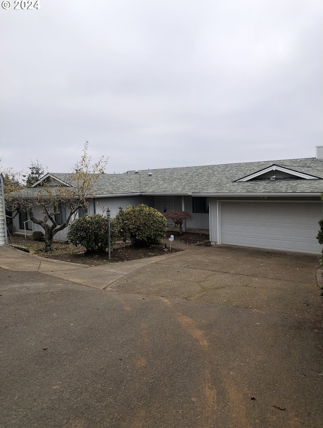 single story home with a garage