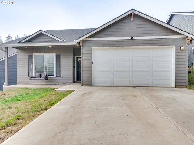 ranch-style home with a garage