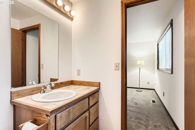 bathroom featuring vanity