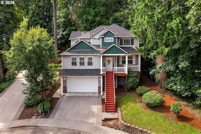 view of front facade featuring a garage and covered porch