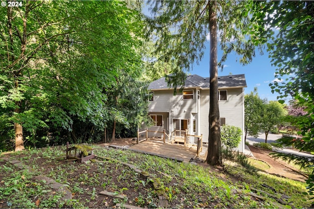 rear view of house with a deck