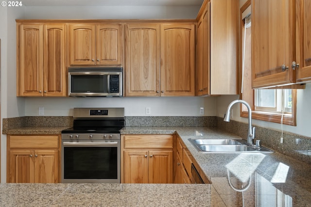 kitchen featuring sink and appliances with stainless steel finishes