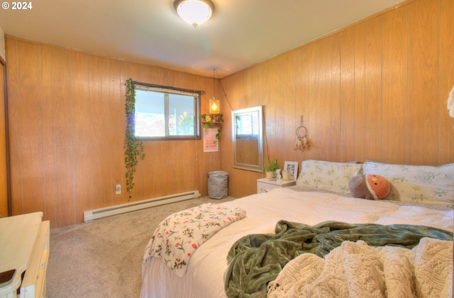 94200 Austin Ct, Gold Beach, OR 97444 - bedroom featuring carpet, wooden walls, and baseboard heating