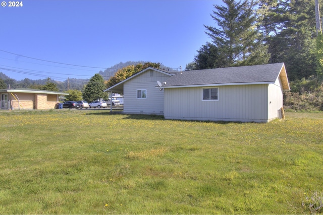 exterior space featuring a yard