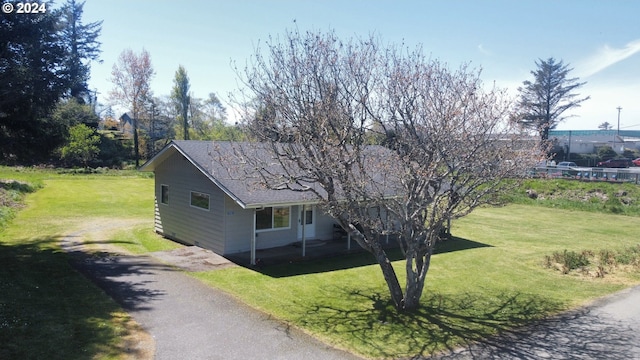 view of front of home with a front yard