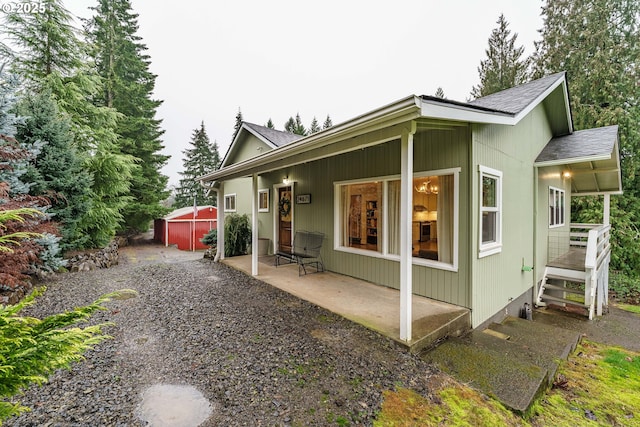 view of side of home featuring a patio