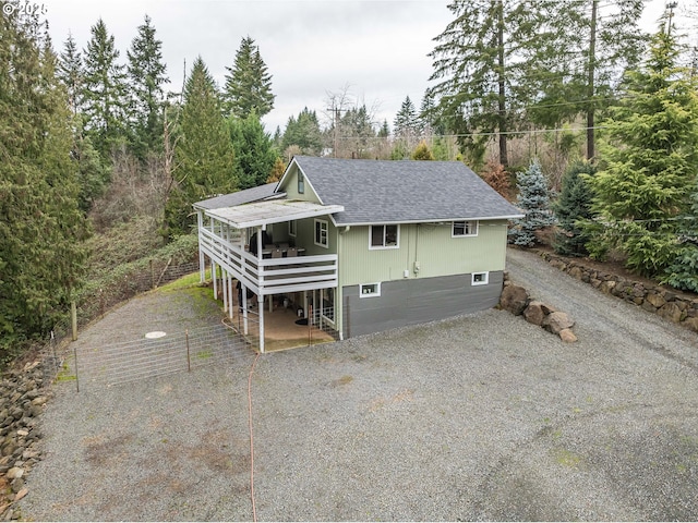 view of side of property with a patio