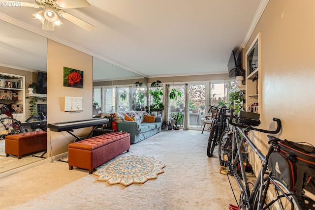 living room featuring ornamental molding, carpet floors, and a healthy amount of sunlight