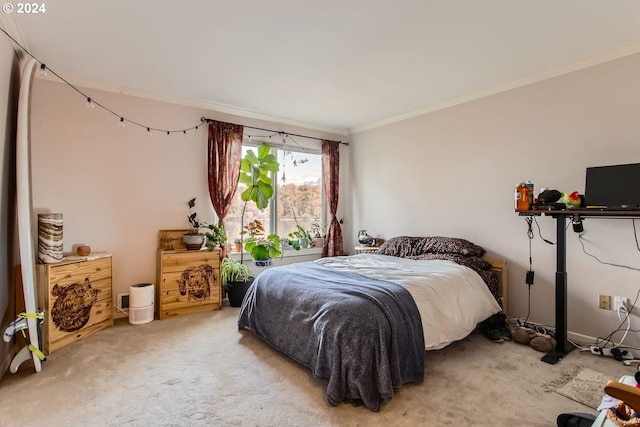 carpeted bedroom with ornamental molding