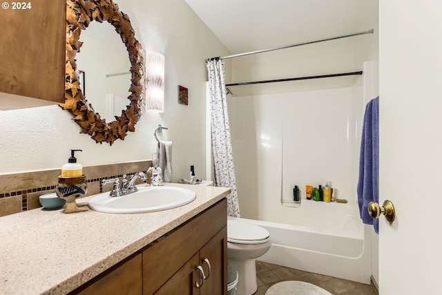 full bathroom with tile patterned flooring, vanity, shower / tub combo with curtain, and toilet