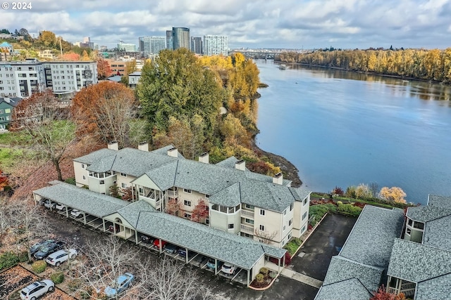 drone / aerial view featuring a water view