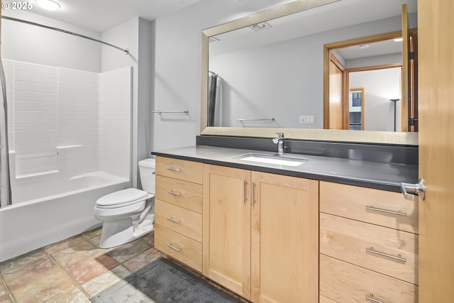 full bathroom featuring toilet, vanity, and shower / tub combo with curtain