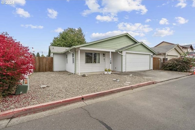 ranch-style house featuring a garage