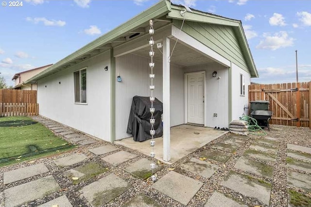 rear view of property with a patio