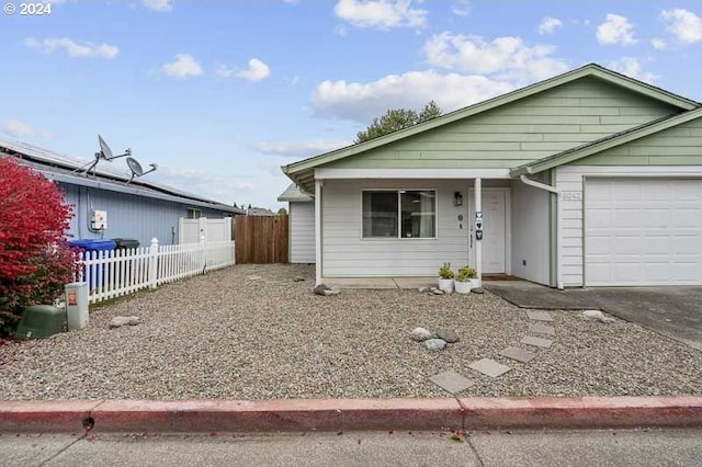 single story home featuring a garage