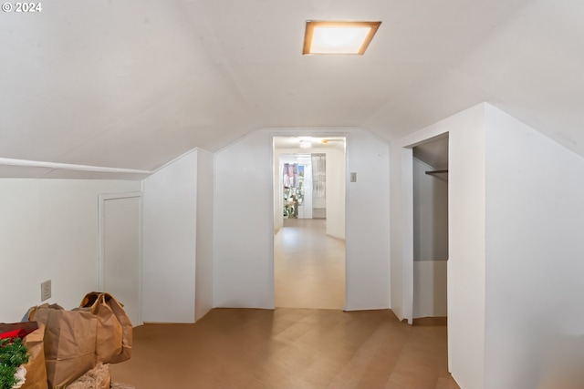 bonus room featuring vaulted ceiling