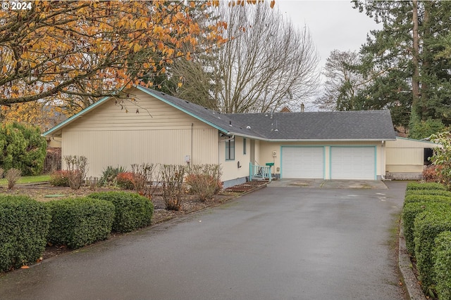 single story home featuring a garage