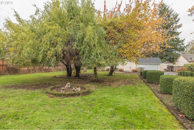 view of yard with a garage