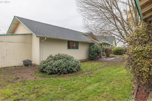 view of home's exterior featuring a yard