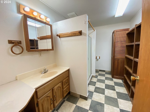 bathroom featuring vanity and walk in shower